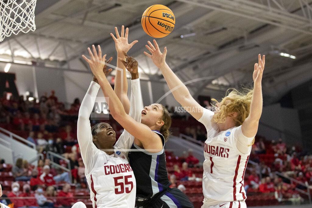 Ben Mckeown Washington State's Bella Murekatete (55) and Tara Wallack (1) battle for a rebound with Kansas State's Ayoka Lee, middle, during the first half of a college basketball game in the first round of the NCAA tournament in Raleigh, N.C., Saturday, March 19, 2022. (AP Photo/Ben McKeown)