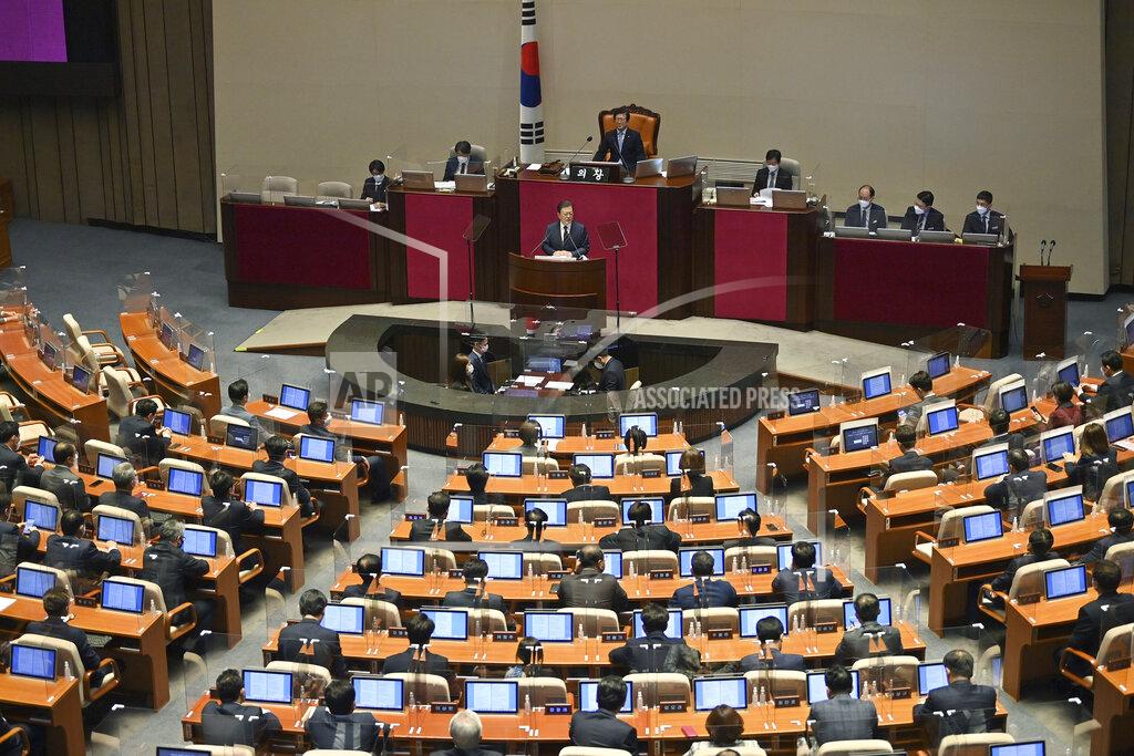 Jung Yeon-Je South Korea's President Moon Jae-in delivers a speech at the National Assembly in Seoul Monday, Oct. 25, 2021. Moon said Monday he’ll keep striving to promote peace with North Korea through dialogue until the end of his term next May, after Pyongyang raised animosities with a resumption of provocative weapons tests. (Jung Yeon-je/Pool Photo via AP)
