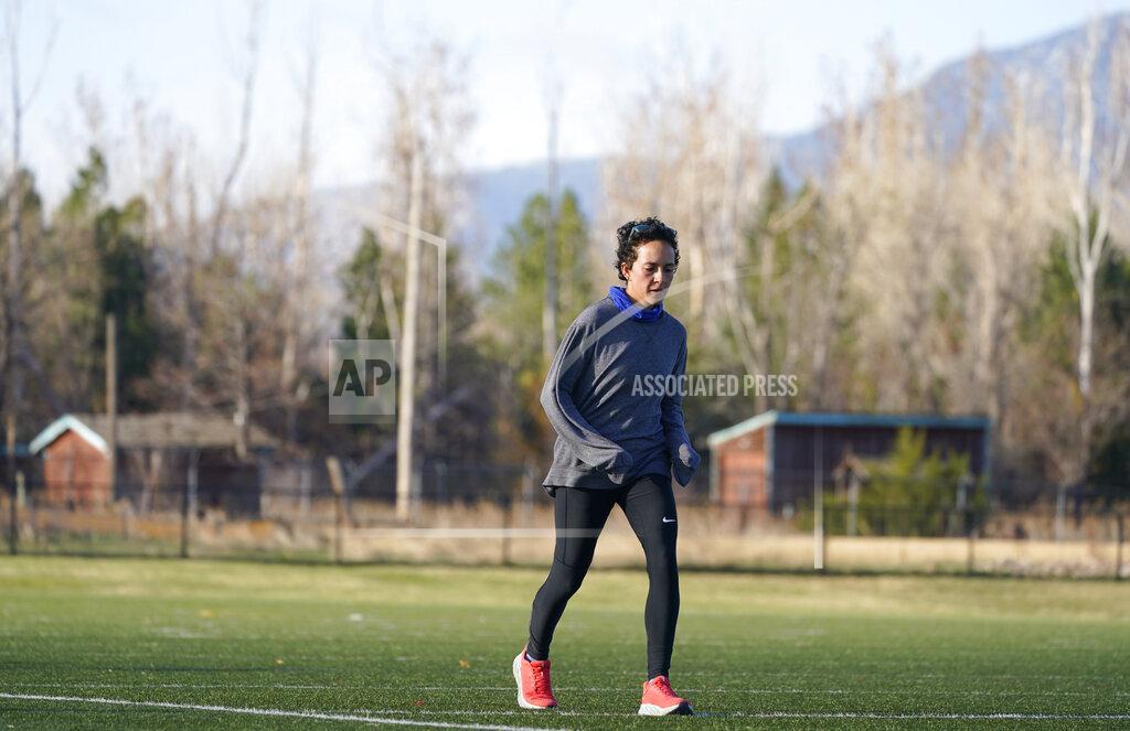 David Zalubowski Olympic hopeful Maggie Montoya is shown as she trains with fellow runners at a park on the east side of Boulder, Colo., Friday, April 9, 2021. The 25-year-old distance runner was working in the pharmacy at the King Soopers supermarket in Boulder, Colorado, on March 22 when 10 people were killed, including a police officer, in a mass shooting. (AP Photo/David Zalubowski)