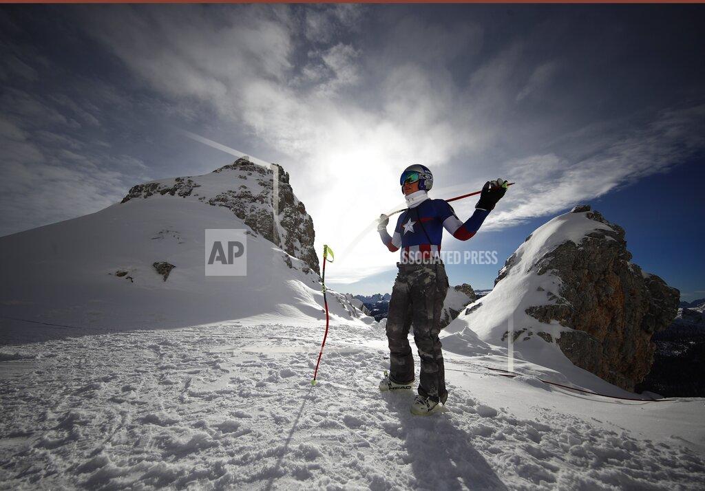 FILE - In this Thursday, Jan.18, 2018 file photo, United States' Lindsey Vonn prepares for an alpine ski, women's World Cup downhill training, in Cortina D'Ampezzo, Italy. Having retired from racing in 2019, Vonn is offering her thoughts on the 2021 world championships in Cortina in a diary with the Associated Press. (AP Photo/Gabriele Facciotti, file)