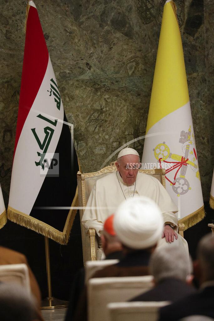 Andrew Medichini Pope Francis meets authorities and civil society at Baghdad's Presidential Palace, Iraq, Friday, March 5, 2021. Pope Francis has arrived in Iraq to urge the country's dwindling number of Christians to stay put and help rebuild the country after years of war and persecution, brushing aside the coronavirus pandemic and security concerns. (AP Photo/Andrew Medichini)