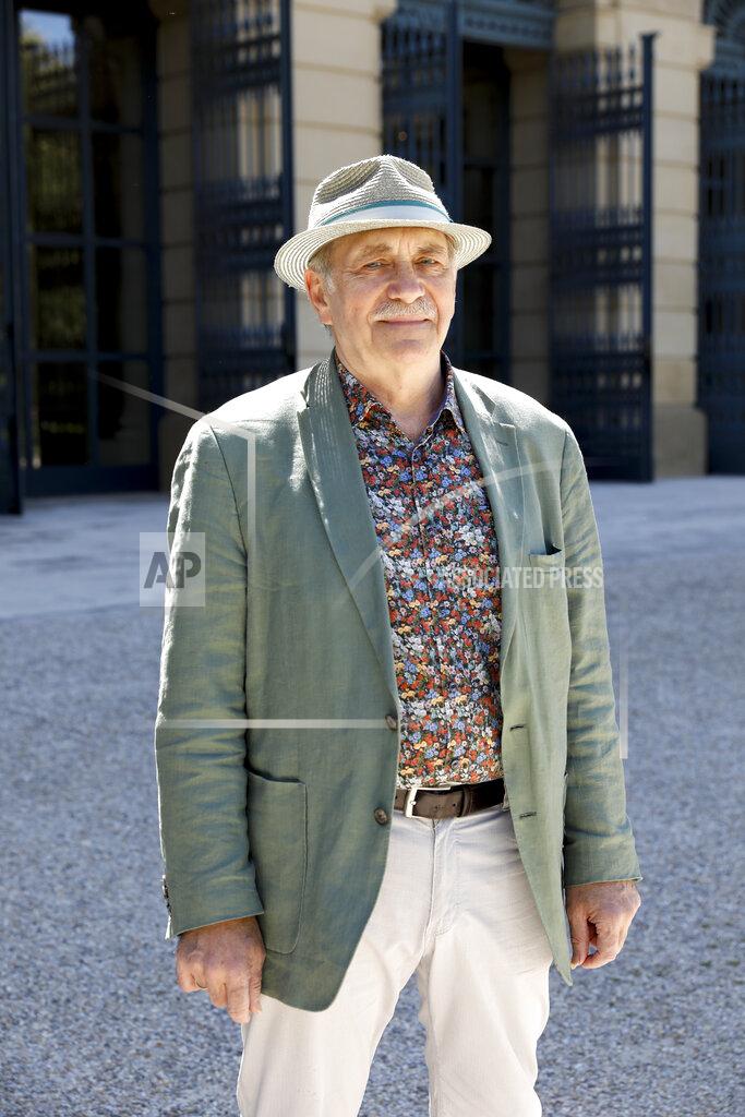Lisa Leutner The Austrian artist and author Gerhard Ruiss poses for a portrait prior to an interview about his initiative 'Frauenmorde – Es geht uns alle an" which means "Femicide- It Concerns Us All" in Vienna, Austria, Tuesday, May 11, 2021. Austria is one of the few European Union countries where the number of women killed is higher than the number of men. The recent high-profile cases have led to widespread protests, demands for government intervention and condemnations from top politicians. (AP Photo/Lisa Leutner)