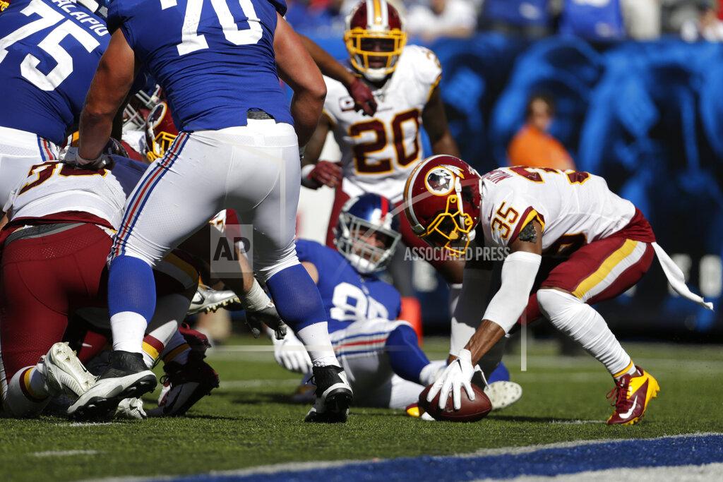 Adam Hunger Washington Redskins' Montae Nicholson recovers a fumble during the second half of an NFL football game against the New York Giants, Sunday, Sept. 29, 2019, in East Rutherford, N.J. (AP Photo/Adam Hunger)