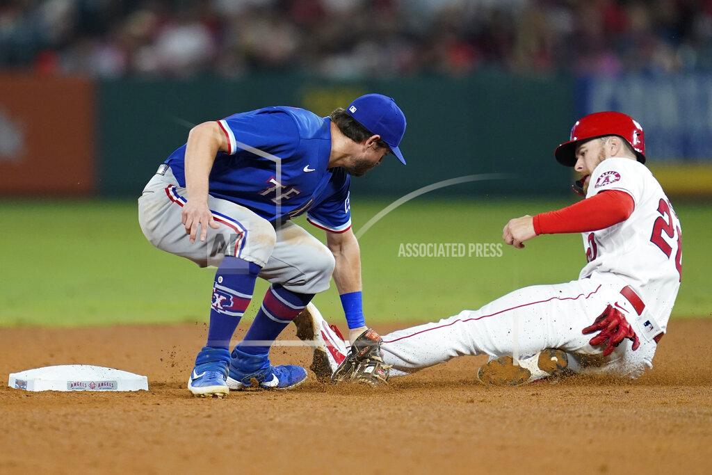 Ashley Landis Los Angeles Angels' Jared Walsh, right, is out at second with a tag by Texas Rangers second baseman Nick Solak during the sixth inning of a baseball game Friday, Sep. 3, 2021, in Anaheim, Calif. (AP Photo/Ashley Landis)