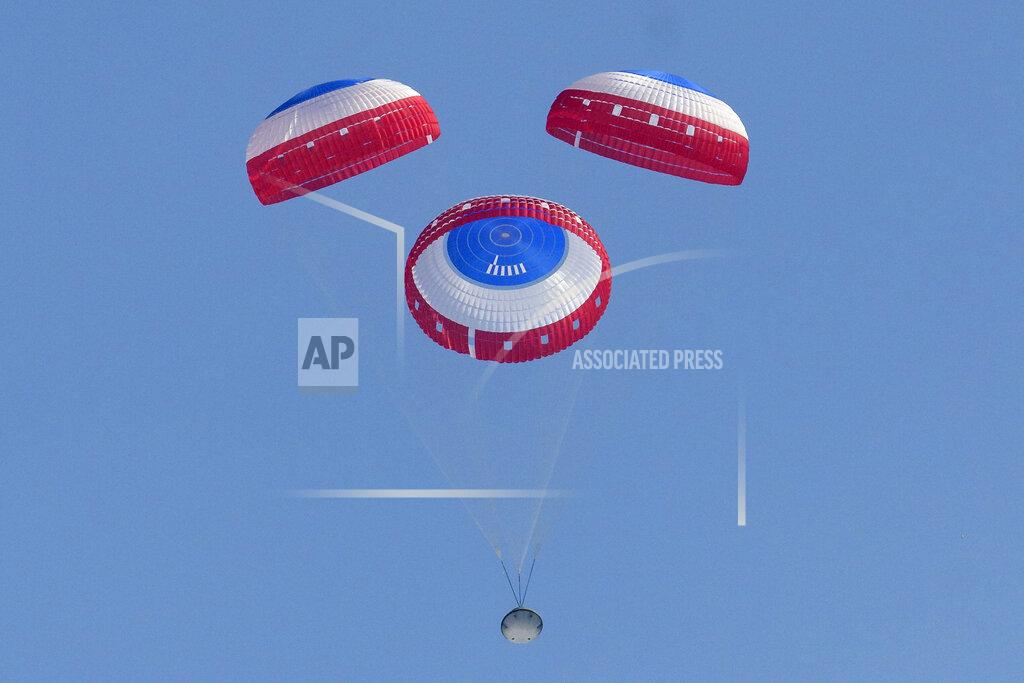 Bill Ingalls Boeing's CST-100 Starliner spacecraft lands at White Sands Missile Range's Space Harbor, Wednesday, May 25, 2022, in New Mexico. (Bill Ingalls/NASA via AP)