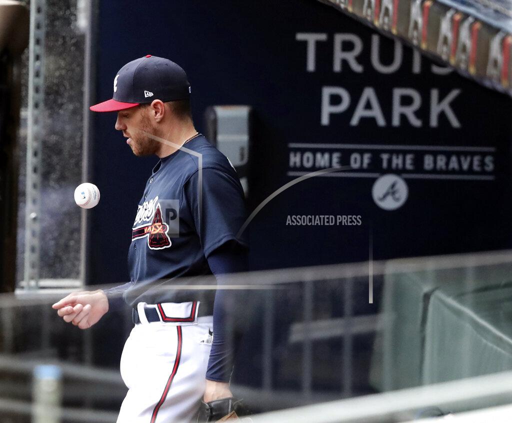 Curtis Compton Atlanta Braves first baseman Freddie Freeman takes the field for an intrasquad baseball game Saturday, July 18, 2020, in Atlanta. It was Freeman's first game since his battle with COVID-19. (Curtis Compton/Atlanta Journal-Constitution via AP)