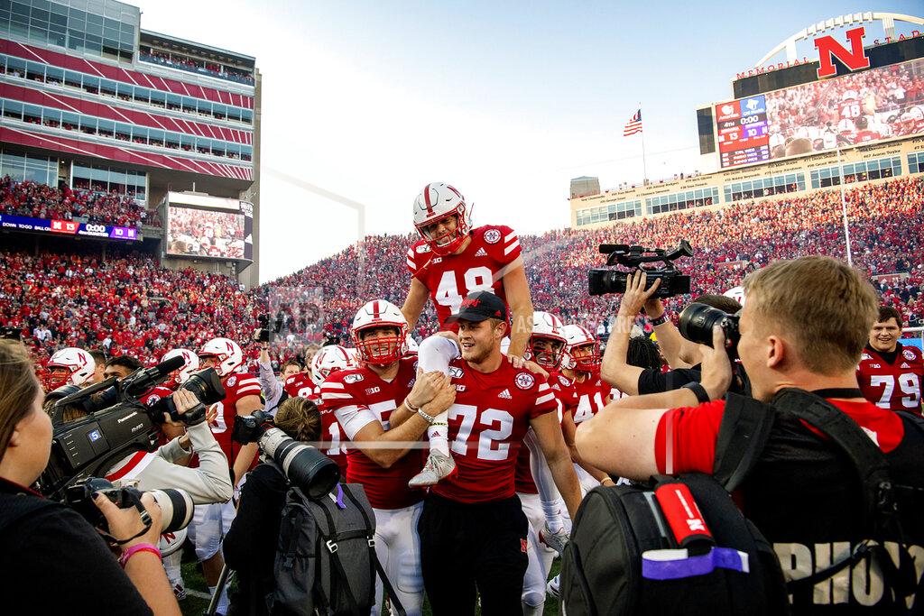 Francis Gardler FILE - In this Saturday, Oct. 5, 2019, file photo, Nebraska kicker Lane McCallum (48) is carried off the field by his teammates after kicking the game-winning field goal as time expired in an NCAA college football game against Northwestern, in Lincoln, Neb. Nebraska's 24-sport program has about 600 athletes and is one of a handful that makes money. Though a 10% budget cut was announced recently, the program is able to absorb the cost of coronavirus testing, in part because of its affiliation with the university’s medical school. (Francis Gardler/Lincoln Journal Star via AP, File)