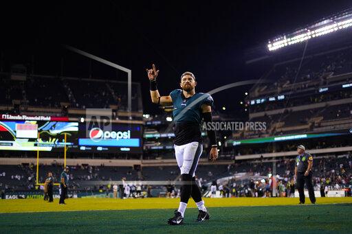 Philadelphia Eagles tight end Zach Ertz gestures as he leaves the field after an NFL football game against the Tampa Bay Buccaneers on aThursday, Oct. 14, 2021, in Philadelphia. (AP Photo/Matt Slocum)