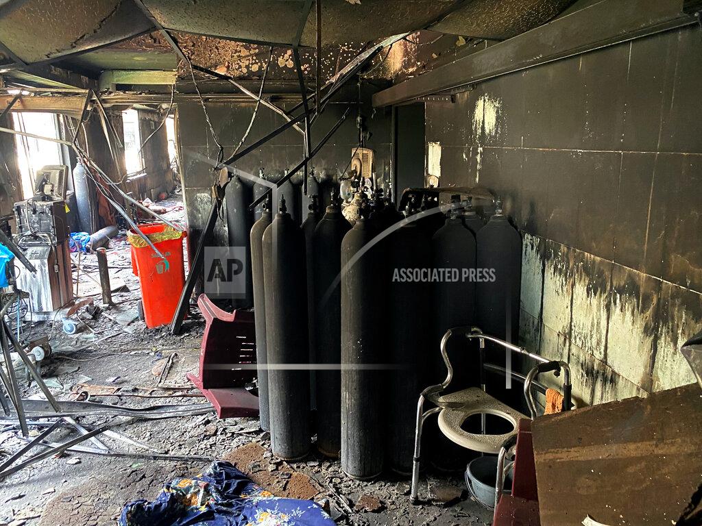 Khalid Mohammed Burned oxygen cylinders are seen in the intensive care unit of the Ibn al-Khatib hospital following a fire that broke out of last Saturday evening killing over 80 people and injuring over 100, in Baghdad, Iraq, Tuesday, April 27, 2021. Medical staff who witnessed the first moments of the fire described horrific scenes: deafening screams, a patient who jumped to his death to escape the inferno and relatives who died because they refused to abandon coronavirus patients tethered to ventilators. (AP Photo/Khalid Mohammed)