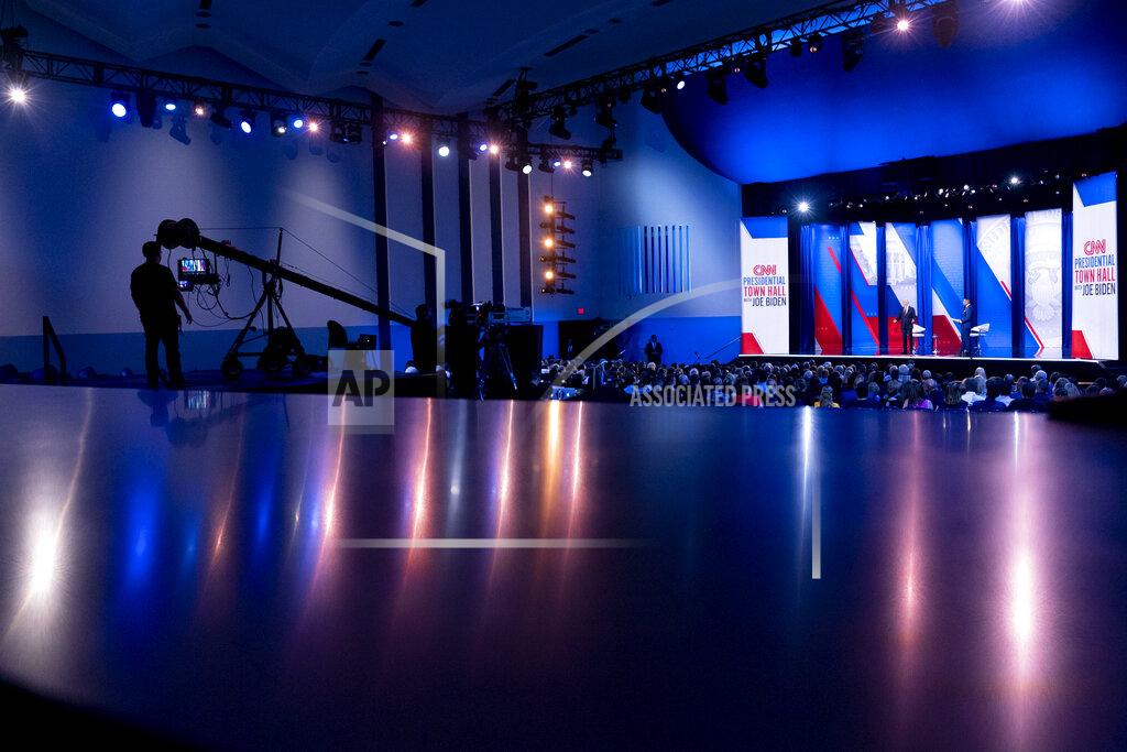 Andrew Harnik President Joe Biden, accompanied by CNN journalist Don Lemon, right, speaks at CNN town hall at Mount St. Joseph University in Cincinnati, Wednesday, July 21, 2021. (AP Photo/Andrew Harnik)