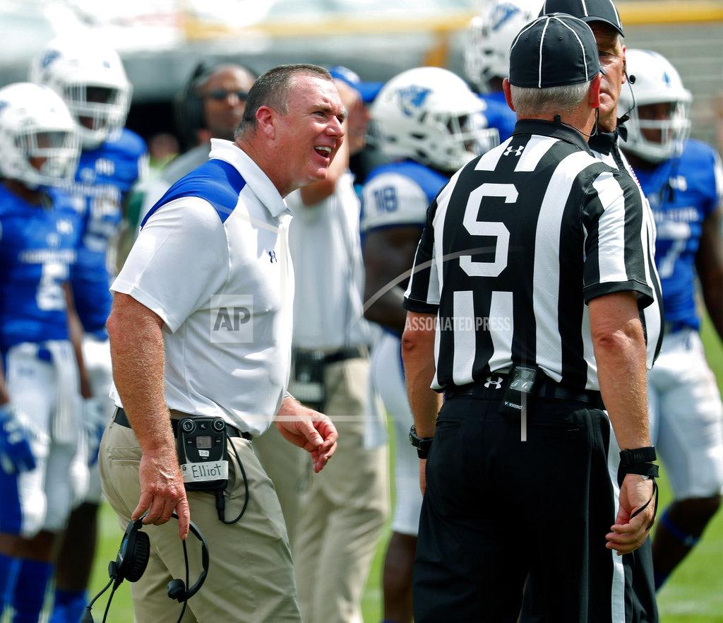 Chris Seward Georgia State head coach Shawn Elliott talks to an official during the second half of an NCAA college football game against North Carolina State in Raleigh, N.C., Saturday, Sept. 8, 2018. (AP Photo/Chris Seward)