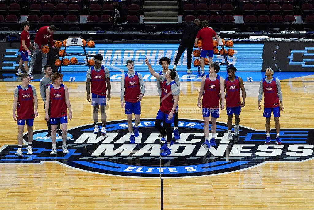 Nam Y. Huh Kansas players walk on the court during a practice for the NCAA men's college basketball tournament Thursday, March 24, 2022, in Chicago. Kansas faces Providence in a Sweet 16 games on Friday.(AP Photo/Nam Y. Huh)