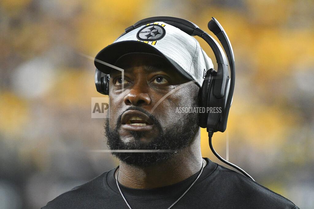 Fred Vuich FILE - In this Aug. 21, 2021, file photo, Pittsburgh Steelers head coach Mike Tomlin walks the sideline during the second half of an NFL preseason football game against the Detroit Lions in Pittsburgh. The defending AFC North champions Steelers face a daunting road if they want to return to the playoffs, beginning with the season opener at Buffalo on Sept. 12. (AP Photo/Fred Vuich, File)