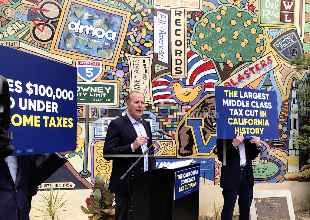 Michael R. Blood FILE - In this Wednesday, May 12, 2021, file photo, Kevin Faulconer, a Republican candidate for California governor, speaks during a news conference in Downey, Calif, where he announced his $15 billion tax-cut proposal. A fading coronavirus crisis and an astounding windfall of tax dollars have reshuffled California’s emerging recall election, allowing Democratic Gov. Gavin Newsom to talk of a mask-free future and propose billions in new spending for schools and businesses as he looks to fend off Republicans who depict him as a foppish failure. (AP Photo/Michael R. Blood, File)