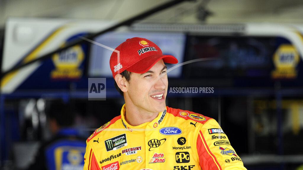 Mike Mccarn Joey Logano waits during practice for Sunday's NASCAR Cup Series auto race at Charlotte Motor Speedway in Concord, N.C., Saturday, Sept. 28, 2019. (AP Photo/Mike McCarn)