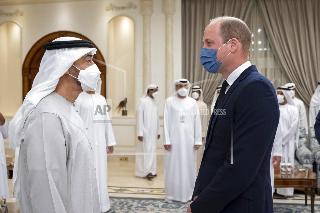 Hamad Al Kaabi This photo made available by the Ministry of Presidential Affairs, shows Prince William, The Duke of Cambridge, right, offering condolences to Sheikh Mohamed bin Zayed Al Nahyan, President of the UAE and Ruler of Abu Dhabi, on the passing of Sheikh Khalifa bin Zayed Al Nahyan, the late President of the UAE, at the Presidential Airport in Abu Dhabi, UAE, Monday, May 16, 2022. (Hamad Al Kaabi/ Ministry of Presidential Affairs via AP)