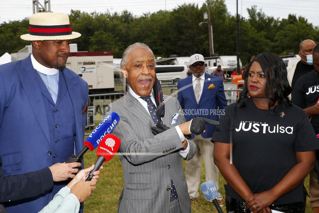 Sue Ogrocki Rev. Al Sharpton, center, speaks at a news conference as Rev Robert Turner, left, and Tiffany Crutcher look on before a Juneteenth rally in Tulsa, Okla., Friday, June 19, 2020,. Juneteenth marks the day in 1865 when federal troops arrived in Galveston, Texas, to take control of the state and ensure all enslaved people be freed, more than two years after the Emancipation Proclamation. (AP Photo/Sue Ogrocki)