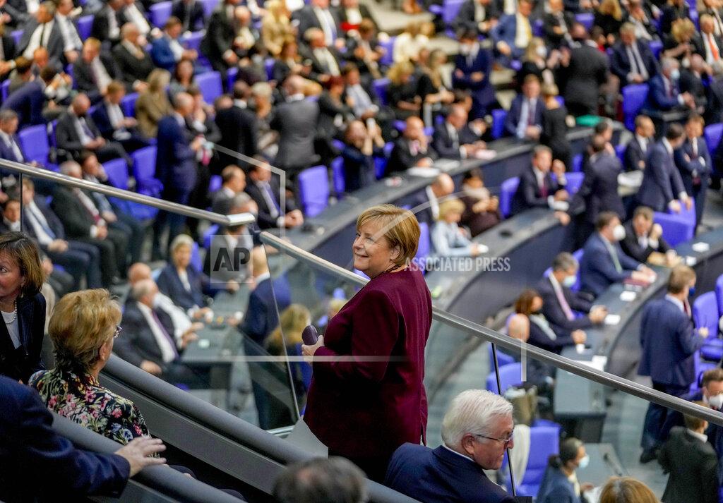 Markus Schreiber German Chancellor Angela Merkel looks around during the first plenary session of the German parliament Bundestag after the elections, Berlin, Tuesday, Oct. 26, 2021. At right German President Frank-Walter Steinmeier. (Photo/Markus Schreiber)
