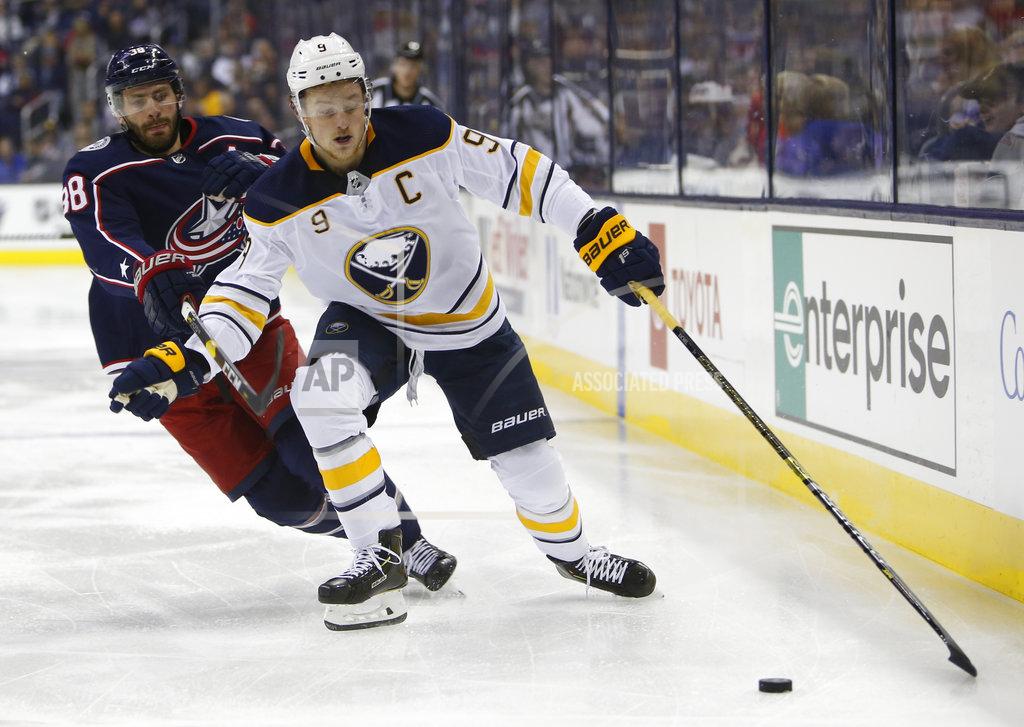 Jay Laprete Buffalo Sabres' Jack Eichel, right, carries the puck past Columbus Blue Jackets' Boone Jenner during the first period of an NHL hockey game Saturday, Oct. 27, 2018, in Columbus, Ohio. (AP Photo/Jay LaPrete)