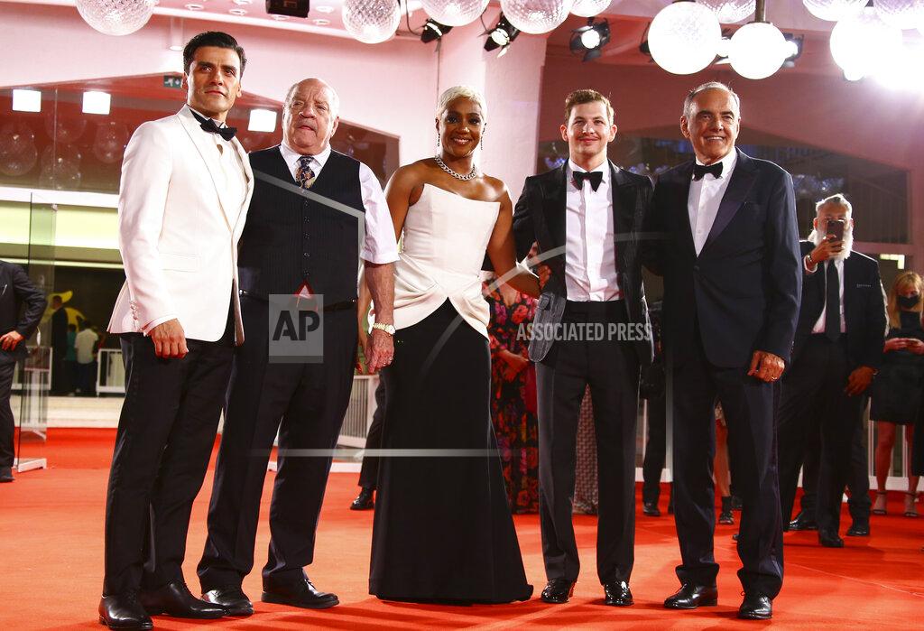 Joel C Ryan Oscar Isaac, from left, Paul Schrader, Tiffany Haddish, Tye Sheridan and Venice Film Festival director Alberto Barbera pose for photographers upon arrival at the premiere of the film 'The Card Counter' during the 78th edition of the Venice Film Festival in Venice, Italy, Thursday, Sep, 2, 2021. (Photo by Joel C Ryan/Invision/AP)
