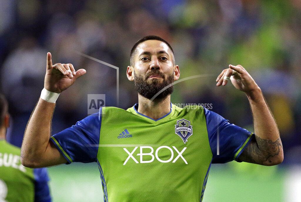 Elaine Thompson FILE - Seattle Sounders' Clint Dempsey motions to fans after scoring the second of his two goals against the Vancouver Whitecaps during the second half of the second leg of an MLS soccer Western Conference semifinal, Thursday, Nov. 2, 2017, in Seattle. Clint Demspey thinks American goalkeepers Zack Steffen and Matt Turner should consider going on loans for the start of next season to get sharp ahead of the World Cup if they are not going to be playing regularly for their Premier League clubs. (AP Photo/Elaine Thompson, File)