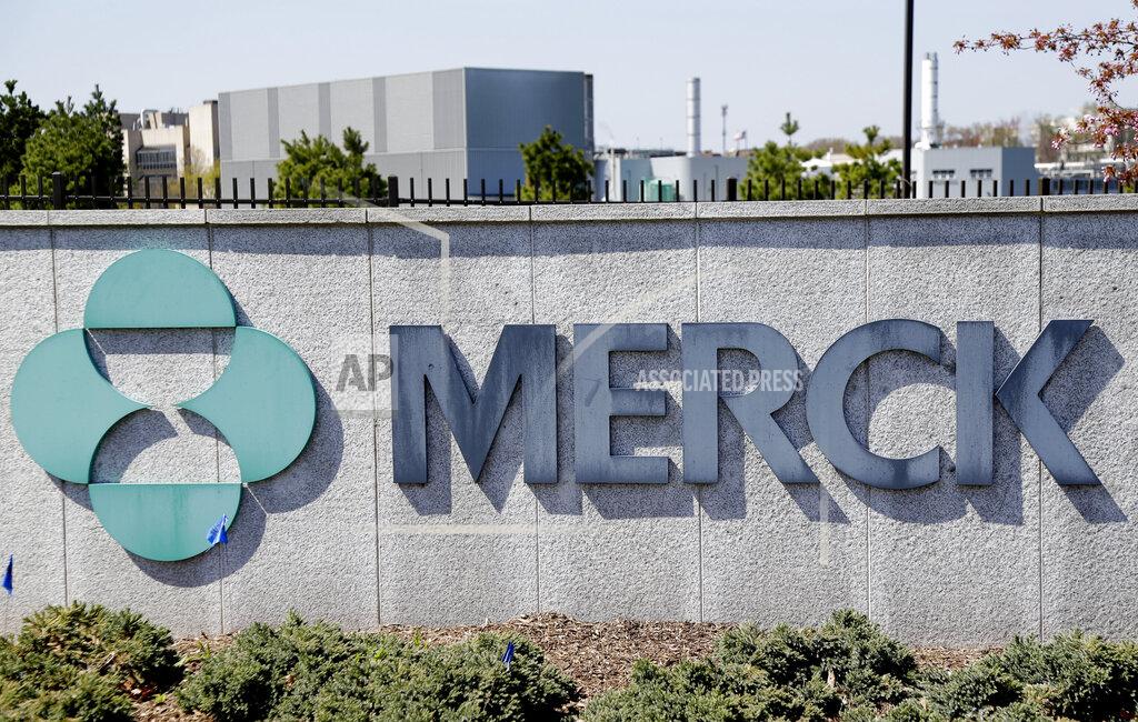 FILE- This May 1, 2018, file photo shows Merck corporate headquarters in Kenilworth, N.J. Merck posted a big fourth-quarter loss, mainly due to much higher spending on research, production and overhead, and announced longtime chief executive, Kenneth Frazier, will retire on July 1, 2021. (AP Photo/Seth Wenig, File)