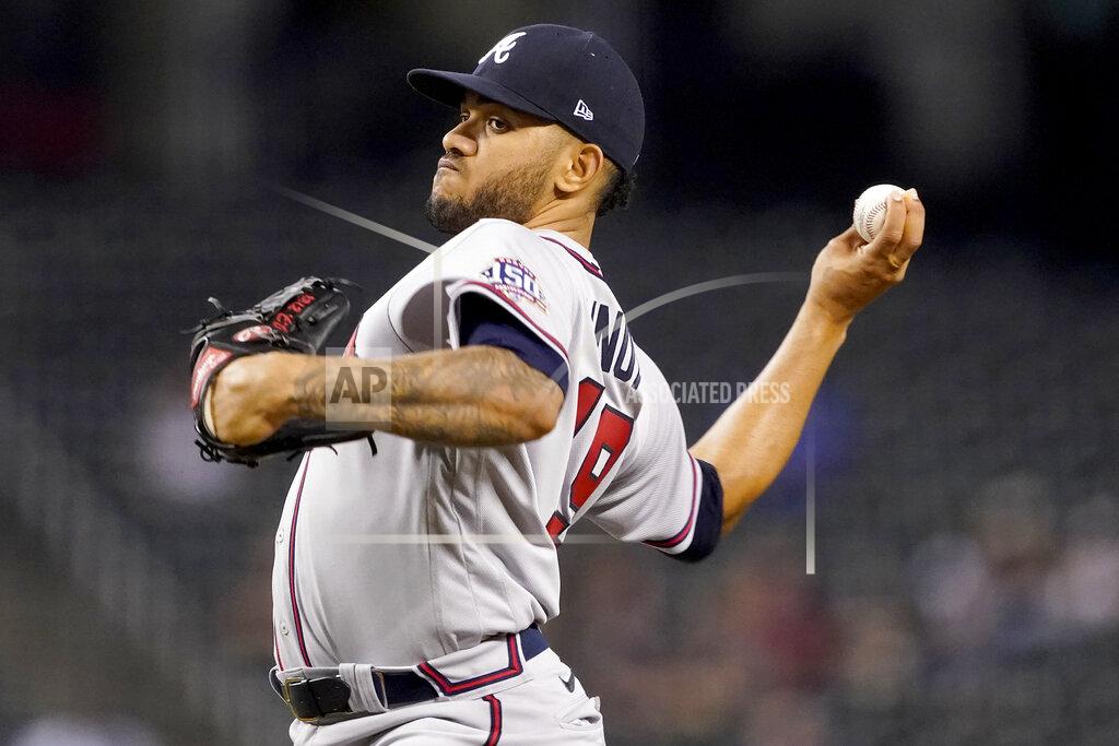Matt York Atlanta Braves starting pitcher Huascar Ynoa throws against the Arizona Diamondbacks during the first inning of a baseball game, Monday, Sept. 20, 2021, in Phoenix. (AP Photo/Matt York)