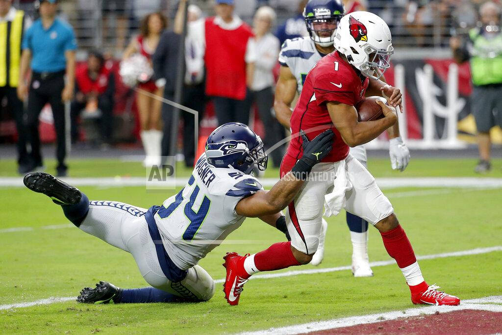 Rick Scuteri Arizona Cardinals quarterback Kyler Murray (1) runs in for a touchdown as Seattle Seahawks middle linebacker Bobby Wagner (54) defends during the second half of an NFL football game, Sunday, Sept. 29, 2019, in Glendale, Ariz. (AP Photo/Rick Scuteri)