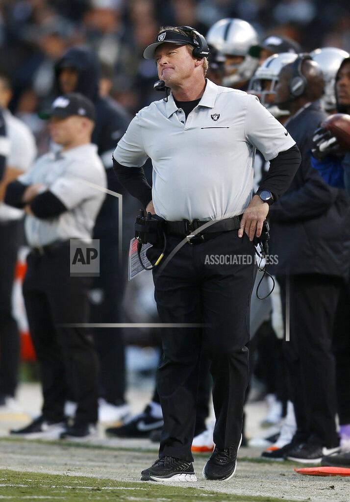 D. Ross Cameron Oakland Raiders head coach Jon Gruden watches from the sideline during the second half of an NFL football game between the Raiders and the Tennessee Titans in Oakland, Calif., Sunday, Dec. 8, 2019. (AP Photo/D. Ross Cameron)