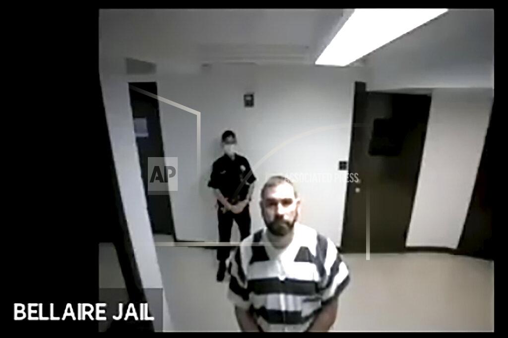 Uncredited In this screen grab from live stream video, Shawn Fix, appears from the Bellaire (Mich)., Country Jail during a virtual hearing at the Grand Traverse 86th District Court., on Oct. 9, 2020, in Traverse City, Mich. Fix is charged with terrorists acts and violating federal firearms laws. His attorney entered a not guilty plea on his behalf and bond was set at $250,000. (Grand Traverse 86th District Court via AP)