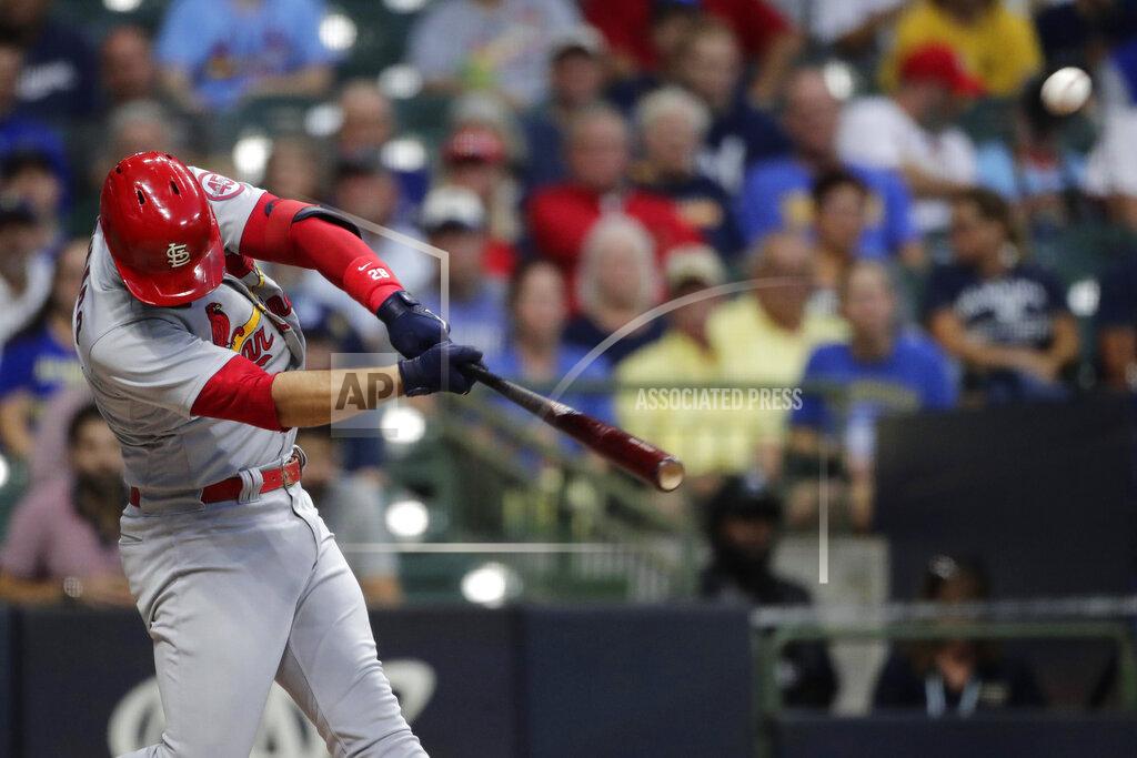 Aaron Gash St. Louis Cardinals' Nolan Arenado hits a two-run home run during the first inning of a baseball game against the Milwaukee Brewers, Monday, Sept. 20, 2021, in Milwaukee. (AP Photo/Aaron Gash)
