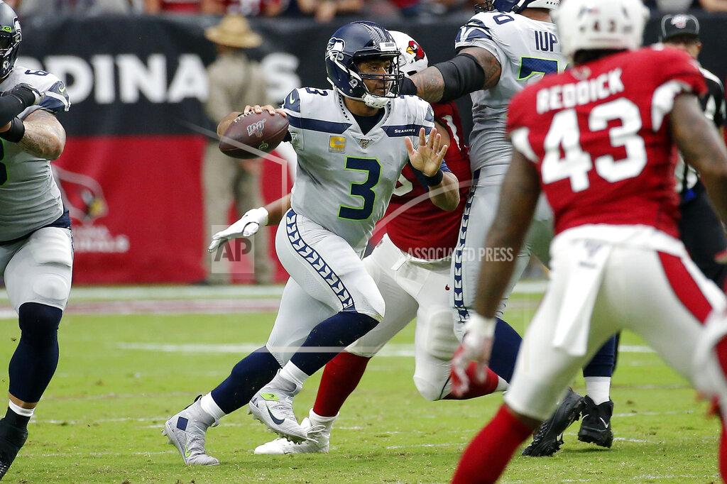 Rick Scuteri Seattle Seahawks quarterback Russell Wilson (3) scrambles against the Arizona Cardinals during the first half of an NFL football game, Sunday, Sept. 29, 2019, in Glendale, Ariz. (AP Photo/Rick Scuteri)