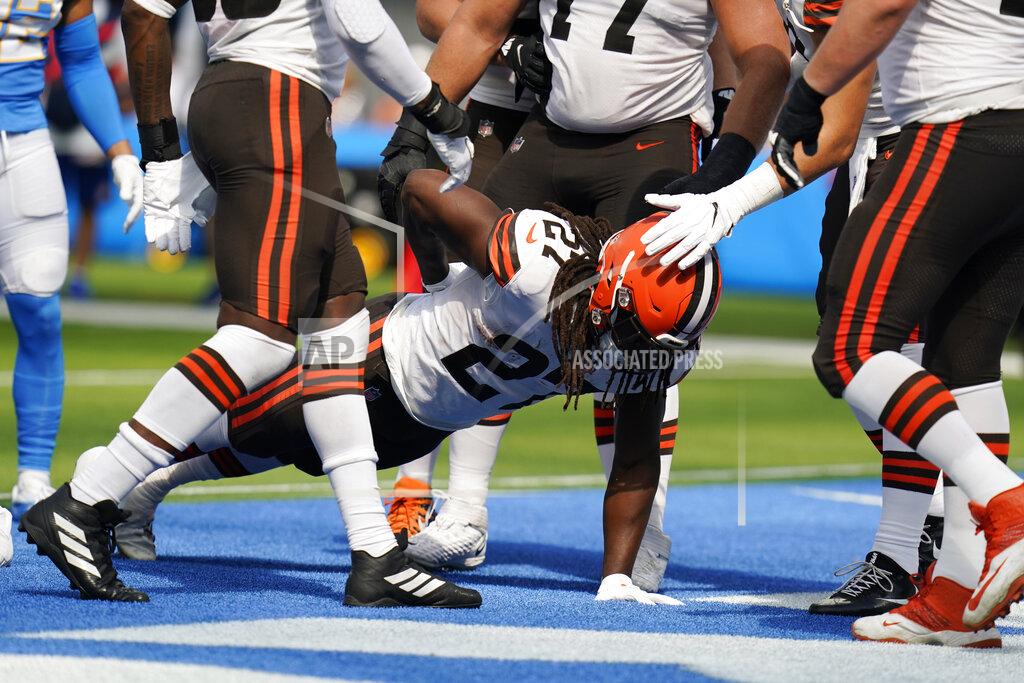 Gregory Bull Cleveland Browns running back Kareem Hunt (27) celebrates his rushing touchdown by doing push-ups during the first half of an NFL football game against the Los Angeles Chargers Sunday, Oct. 10, 2021, in Inglewood, Calif. (AP Photo/Gregory Bull)