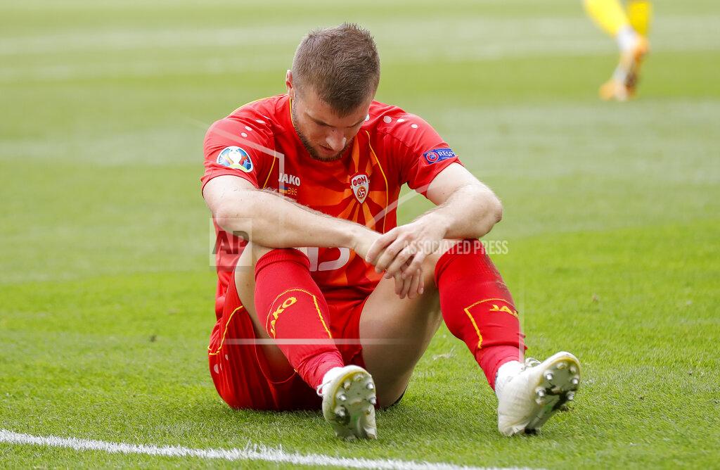 Robert Ghement North Macedonia's Stefan Ristovski reacts during the Euro 2020 soccer championship group C match between Ukraine and North Macedonia at the National Arena stadium in Bucharest, Romania, Thursday, June 17, 2021. (AP Photo/Robert Ghement, Pool)