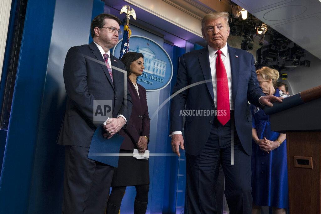 Evan Vucci President Donald Trump departs after a press briefing with the coronavirus task force, at the White House, Wednesday, March 18, 2020, in Washington, with Veterans Affairs Secretary Robert Wilkie, Administrator of the Centers for Medicare and Medicaid Services Seema Verma and Dr. Deborah Birx, White House coronavirus response coordinator. (AP Photo/Evan Vucci)