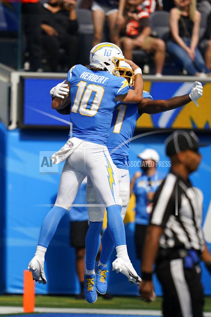 Gregory Bull Los Angeles Chargers wide receiver Mike Williams, right, celebrates his touchdown catch with quarterback Justin Herbert (10) during the first half of an NFL football game against the Cleveland Browns Sunday, Oct. 10, 2021, in Inglewood, Calif. (AP Photo/Gregory Bull)