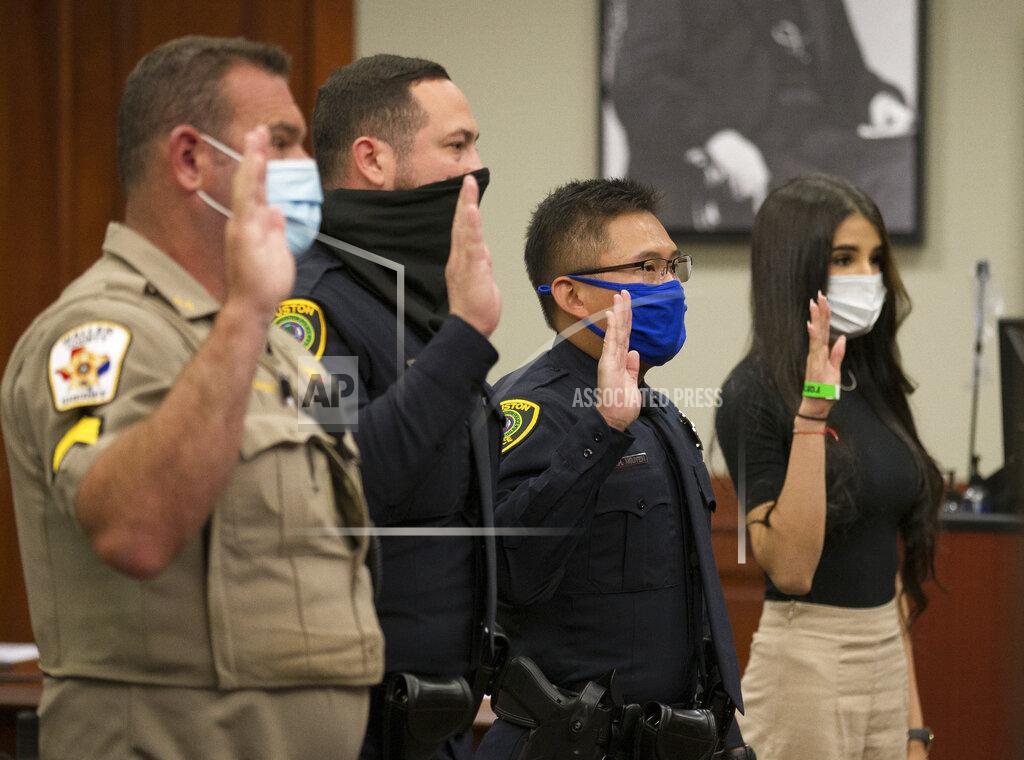 Godofredo A. Vásquez Witnesses are addressed by the judge during a bond revocation hearing on a murder charge for Victor Hugo Cuevas, a 26-year-old who has been recently linked to a missing tiger named India, at Fort Bend County Justice Center on Friday, May 14, 2021, in Richmond, Texas. Prosecutors in Fort Bend County are seeking to revoke a bond for Victor Hugo Cuevas after he was charged with murder in a 2017 fatal shooting. (Godofredo A. Vásquez/Houston Chronicle via AP)