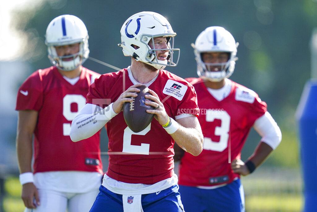 Michael Conroy Indianapolis Colts quarterback Carson Wentz (2) throws during a drill during practice at the NFL team's football training camp in Westfield, Ind., Tuesday, Aug. 24, 2021. (AP Photo/Michael Conroy)