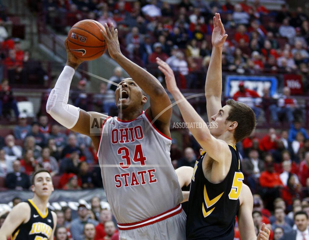 Paul Vernon Ohio State forward Kaleb Wesson, left, goes up for a shot next to Iowa forward Nicholas Baer during the second half of an NCAA college basketball game in Columbus, Ohio, Tuesday, Feb. 26, 2019. Ohio State won 90-70. (AP Photo/Paul Vernon)