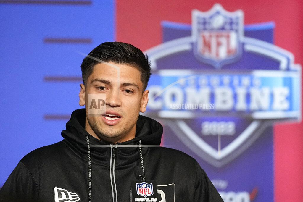 FILE - Mississippi quarterback Matt Corral speaks during a press conference at the NFL football scouting combine, Wednesday, March 2, 2022, in Indianapolis. Corral is a possible pick in the NFL Draft. (AP Photo/Darron Cummings, File)