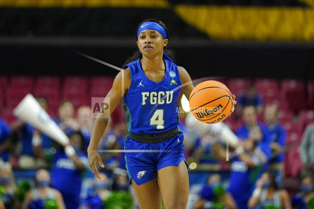 Julio Cortez Florida Gulf Coast guard Tishara Morehouse dribbles up court against Maryland during the first half of a college basketball game in the second round of the NCAA tournament, Sunday, March 20, 2022, in College Park, Md. (AP Photo/Julio Cortez)