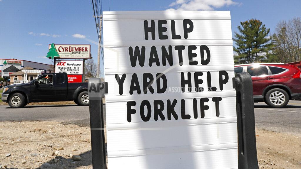Charles Krupa A help wanted sign is posted outside Cyr Lumber in Windham, N.H., Thursday, May 7, 2020. Roughly 33.5 million people have now filed for jobless aid in the seven weeks since the coronavirus began forcing millions of companies to close their doors and slash their workforces. (AP Photo/Charles Krupa)