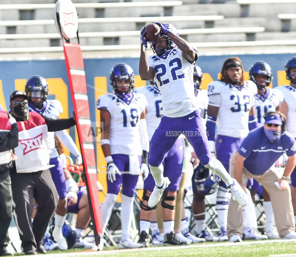 William Wotring TCU wide receiver Blair Conwright (22) makes a catch against West Virginia during the second half of an NCAA college football game on Saturday, Nov. 14, 2020, in Morgantown, W.Va. (William Wotring/The Dominion-Post via AP)