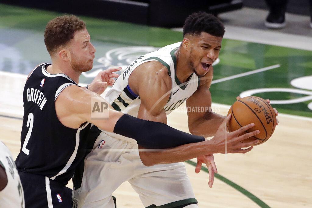 Aaron Gash Milwaukee Bucks' Giannis Antetokounmpo is fouled by Brooklyn Nets' Blake Griffin during the second half of an NBA basketball game Tuesday, May 4, 2021, in Milwaukee. (AP Photo/Aaron Gash)
