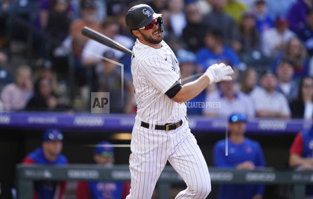 David Zalubowski Colorado Rockies' Kris Bryant flies out against Chicago Cubs relief pitcher David Robertson in the ninth inning of a baseball game Sunday, April 17, 2022, in Denver. (AP Photo/David Zalubowski)