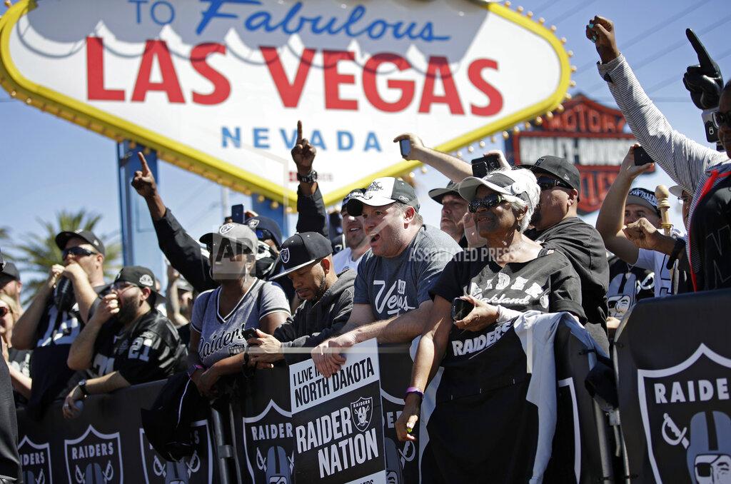 John Locher FILE - In this April 29, 2017, file photo, fans cheer as the Oakland Raiders announce their fourth round draft pick during an NFL football draft event in Las Vegas. The NFL was so petrified of being associated with gambling or sports betting that up until recently players were forbidden to go into casinos, and anything associated with Las Vegas was suspect. (AP Photo/John Locher, File)