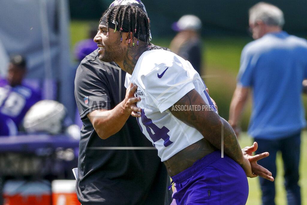 Bruce Kluckhohn Minnesota Vikings tight end Irv Smith Jr. takes part in drills at the NFL football team's practice facility in Eagan, Minn., Saturday, July 30, 2022. (AP Photo/Bruce Kluckhohn)