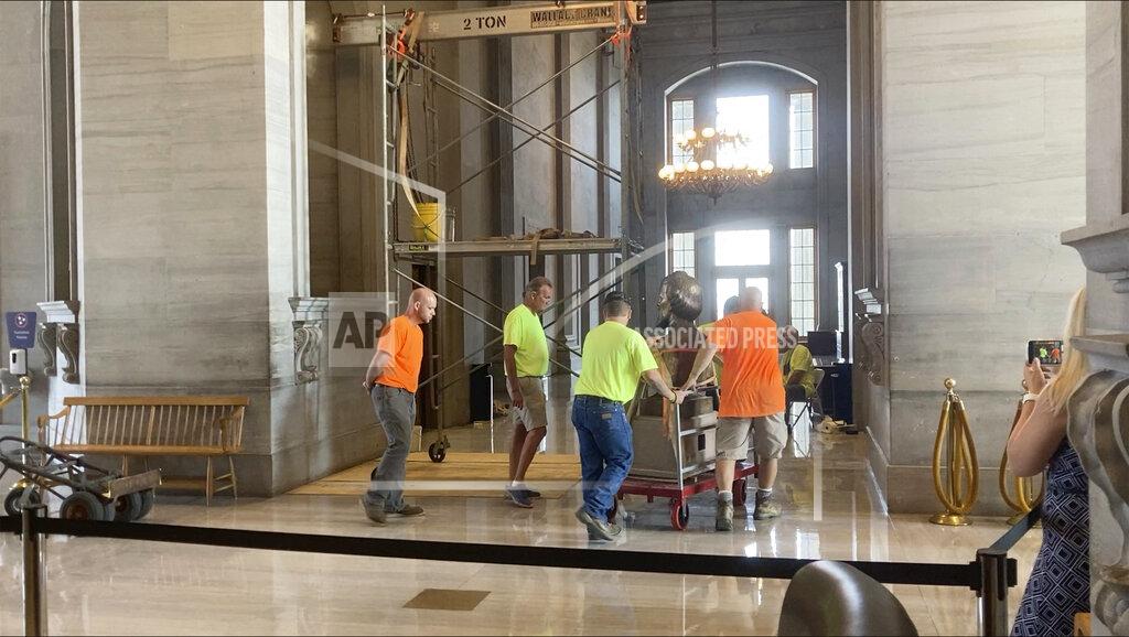 Kimberlee Kruesi The Nathan Bedford Forrest bust is removed from inside of the Tennessee Capitol on Friday, July 23, 2021 in Nashville. Tennessee’s State Building Commission voted 5-2 to remove the bust of the Confederate general and early Ku Klux Klan leader on Thursday, the final hurdle in a months-long process. (AP Photo/Kimberlee Kruesi)