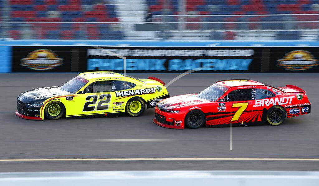 Ralph Freso Austin Cindric (22) and Justin Allgaier (7) race for the lead through Turn 4 during a NASCAR Xfinity Series auto race at Phoenix Raceway, Saturday, Nov. 7, 2020, in Avondale, Ariz. (AP Photo/Ralph Freso)