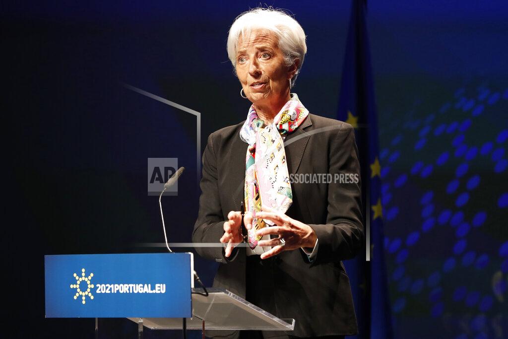 Armando Franca FILE - European Central Bank President Christine Lagarde speaks during a media conference in Lisbon, Friday, May 21, 2021. Lagarde says Europe's monetary authority isn't about to ‘overreact’ to temporary inflation by tightening policy. Lagarde said Tuesday, Sept. 28, 2021 that currently higher inflation of 3% in the eurozone is temporary, caused by bottlenecks and one-time factors. (AP Photo/Armando Franca, file)